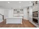 Spacious kitchen with stainless steel appliances and a large center island at 2926 Sailhouse Drive, St Cloud, FL 34771