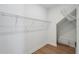 Walk-in closet featuring bright-white walls and shelving to maximize storage at 2926 Sailhouse Drive, St Cloud, FL 34771