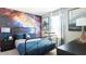 Fun bedroom decor with cool galaxy wall design at 3005 Namaste Dr, Clermont, FL 34714