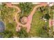 Overhead aerial shot showcasing Albert Park's verdant pathways and meticulously landscaped grounds at 3007 Knollwood Cir, Orlando, FL 32804