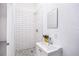Modern bathroom features a tiled shower, updated vanity, and neutral color scheme at 3007 Knollwood Cir, Orlando, FL 32804