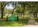 Dartmouth Park sign and landscaped sidewalk in a beautiful green park at 3007 Knollwood Cir, Orlando, FL 32804