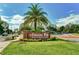 Welcome to College Park sign with a palm tree in the background at 3007 Knollwood Cir, Orlando, FL 32804