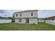 Two story home with a green backyard and white fence at 3222 Reserve Ct, Orlando, FL 32825