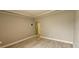 An empty living room with wood-look floors, neutral walls and bright, white trim at 3222 Reserve Ct, Orlando, FL 32825