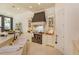 Elegant kitchen with a large island, custom cabinets, and a black gas range at 3429 Regal Crest Dr, Longwood, FL 32779
