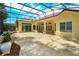 Enclosed patio with tiled flooring, pillars, and access to the yard and a luxurious home at 3429 Regal Crest Dr, Longwood, FL 32779