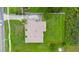 An aerial view shows the layout of this home's roof and the surrounding property at 3779 N Econlockhatchee Trl, Orlando, FL 32817
