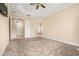 Neutral-toned primary bedroom with carpet, and multiple access points at 3779 N Econlockhatchee Trl, Orlando, FL 32817