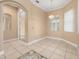 Inviting dining area featuring stylish tile flooring and natural light, adjacent to other rooms at 3779 N Econlockhatchee Trl, Orlando, FL 32817