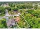 Aerial view of the single Gathering home with lush greenery; perfect for enjoying nature and relaxing in the outdoors at 4133 Cepeda St, Orlando, FL 32811