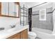 Bathroom featuring a vanity with mirror, shower with tub, and tile flooring at 4133 Cepeda St, Orlando, FL 32811