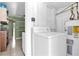 Laundry room featuring a washer and water heater at 4133 Cepeda St, Orlando, FL 32811