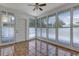 Enclosed sunroom with tile flooring and lots of windows at 441 S Primrose Dr, Orlando, FL 32803