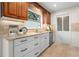 This modern kitchen features granite countertops, stainless steel appliances, and ample cabinet space at 501 Benedict Ct, Casselberry, FL 32707