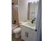 Modern bathroom featuring a new vanity, toilet, and tiled shower/tub with sleek black fixtures at 524 Marion Oaks Blvd, Ocala, FL 34473