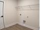 A conveniently located laundry room with shelving and hookups ready for appliances at 524 Marion Oaks Blvd, Ocala, FL 34473