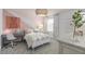 Bright bedroom featuring colorful accents, a charming desk area, and a cozy atmosphere at 6005 Blue View Way, St Cloud, FL 34771