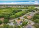 Overhead view of a house near a lush green area, highlighting its residential neighborhood at 6902 Coral Cove Dr, Orlando, FL 32818