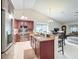 Modern kitchen with granite countertops, stainless steel appliances, and an open layout at 6902 Coral Cove Dr, Orlando, FL 32818