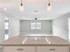 Open-concept kitchen and living area with recessed lighting and a ceiling fan at 8676 Hillside Dr, Orlando, FL 32810