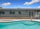 View of pool featuring steps for easy entry and exit at 8676 Hillside Dr, Orlando, FL 32810