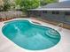 Large swimming pool with steps, perfect for cooling off on summer days at 8676 Hillside Dr, Orlando, FL 32810