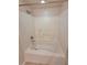 Clean, bright bathtub with shower head and tiled surround, offering a relaxing and functional bathroom space at 911 N Orange Ave # 440, Orlando, FL 32801
