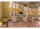 Inviting common area with comfortable seating, hardwood floors, and large windows at 911 N Orange Ave # 440, Orlando, FL 32801