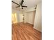 Well-lit living room features stylish hardwood floors and neutral paint at 911 N Orange Ave # 440, Orlando, FL 32801
