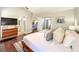 Spacious bedroom with a king bed, TV, and easy access to the porch at 10360 Crystal Point Dr, Orlando, FL 32825