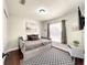 Comfortable bedroom featuring a daybed, plush pillows, and a stylish accent rug at 10360 Crystal Point Dr, Orlando, FL 32825