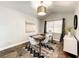 Cozy dining room with decorative lighting and modern furnishings at 10360 Crystal Point Dr, Orlando, FL 32825