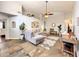 Open living area with slate floors, tall ceiling, and modern decor accents at 10360 Crystal Point Dr, Orlando, FL 32825