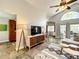 Comfortable living room with slate floors, modern decor, and plenty of natural light at 10360 Crystal Point Dr, Orlando, FL 32825