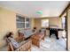 Comfortable patio area with seating, a coffee table, and a barbecue grill at 10360 Crystal Point Dr, Orlando, FL 32825