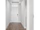Inviting foyer with neutral paint, tile floors, and a stylish front door at 11027 Hollow Bay Dr, Winter Garden, FL 34787