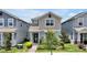 Charming two-story home with inviting entrance and a small front yard at 11288 Listening Dr, Orlando, FL 32832
