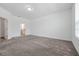 Large bedroom with carpet, bright natural light from window, and ensuite bathroom at 11288 Listening Dr, Orlando, FL 32832