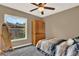 Cozy bedroom with carpet floors, a ceiling fan, and a wardrobe at 1210 Quintuplet Dr, Casselberry, FL 32707