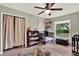 bedroom with carpet floor, toys, and a window view at 1210 Quintuplet Dr, Casselberry, FL 32707