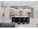 Open kitchen with an island, stainless steel appliances, bar stool seating, and pendant lighting at 1265 Estancia Woods Loop, Windermere, FL 34786