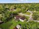 Aerial view of a home with a backyard and proximity to wooded area at 137 W Lauren Ct, Fern Park, FL 32730
