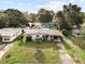 Aerial view of a single-Gathering home with a driveway and landscaping at 137 W Lauren Ct, Fern Park, FL 32730