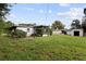 Spacious backyard featuring a shed and lush green grass at 137 W Lauren Ct, Fern Park, FL 32730