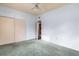 Bedroom featuring closet, neutral walls, and a view into the hallway at 137 W Lauren Ct, Fern Park, FL 32730