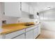 The kitchen features white cabinets and a stainless-steel sink at 137 W Lauren Ct, Fern Park, FL 32730