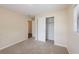 Neutral bedroom with closet, window, carpet, and base trim at 1417 Pine Lake Rd, Orlando, FL 32808