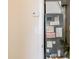 Utility closet features HVAC system, water lines, and thermostat at 1417 Pine Lake Rd, Orlando, FL 32808