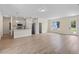 Open-concept kitchen and living area with modern finishes, stainless appliances, and plenty of natural light at 14470 Sw 46Th Ct, Ocala, FL 34473